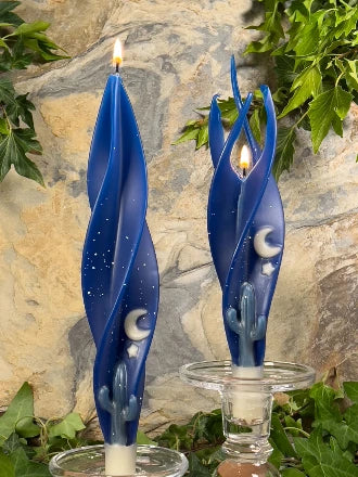 Lit blue moon and stars beeswax candles